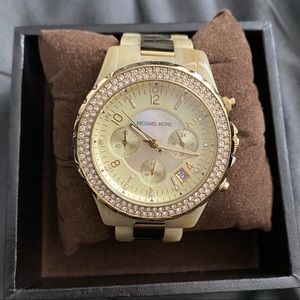 Gorgeous light shell and gold MK watch.